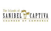 Logo for The Islands of Sanibel & Captiva Chamber of Commerce with palm trees by the text.