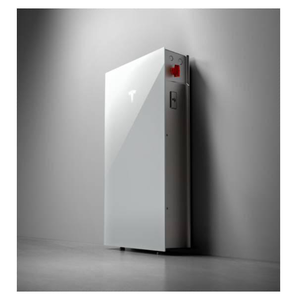 Tall white electrical cabinet/enclosure with a red emergency button on top, standing against a gray wall.
